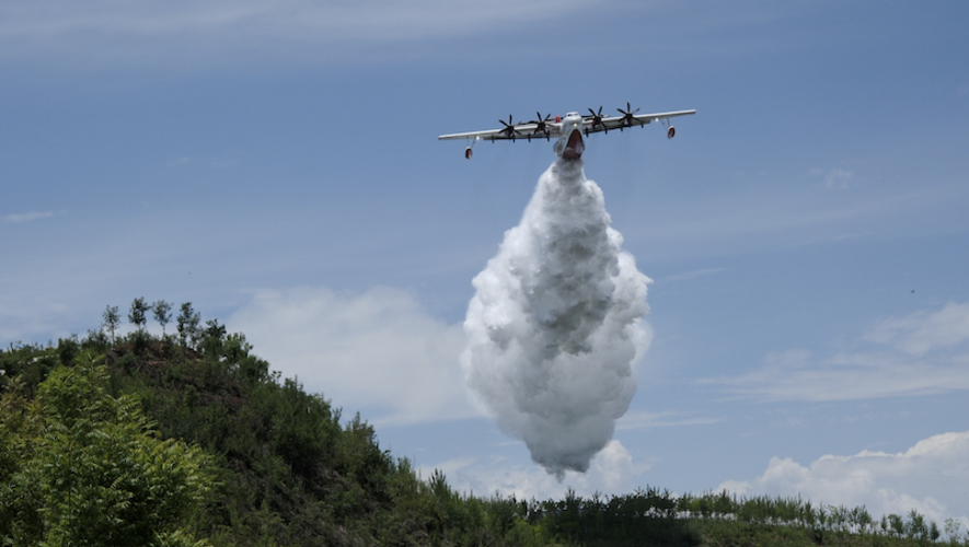 AVIC's AG600 Kunlong amphibious aircraft conducts water drop during firefighting trials.